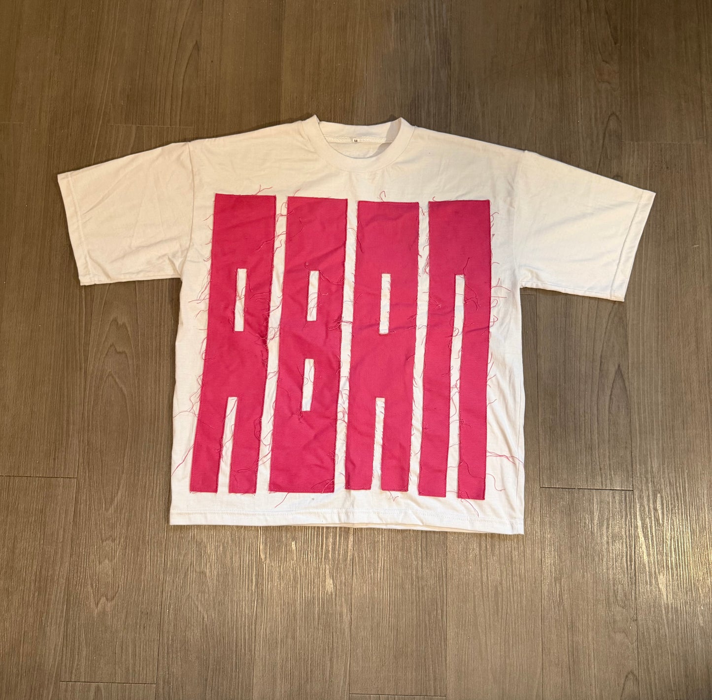 FORTIFIED TEE PINK ON WHITE